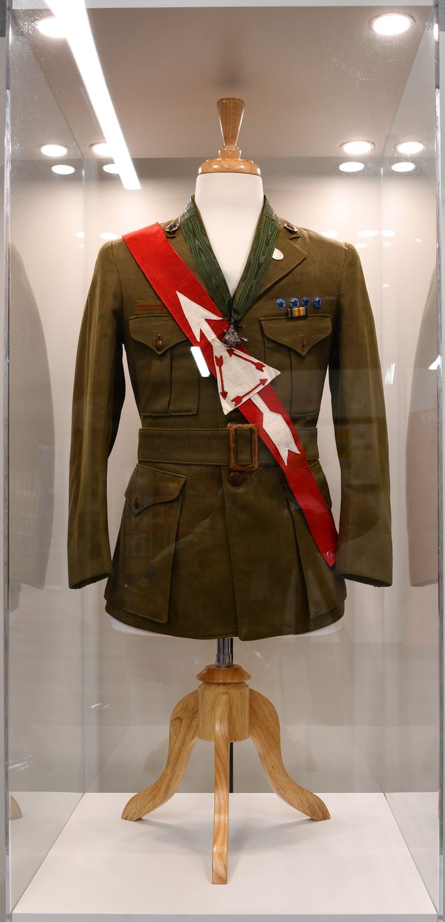 Dr. E. Urner Goodman tunic with a red Vigil Honor sash and green neck-ribbon Distinguished Service Award.